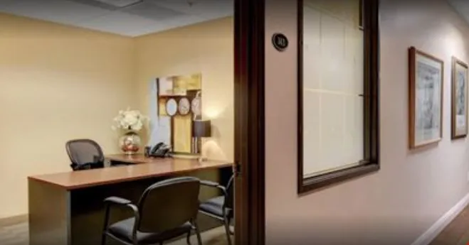 Private consultation office at Lakeside Business Suites in Las Vegas with a desk and guest seating